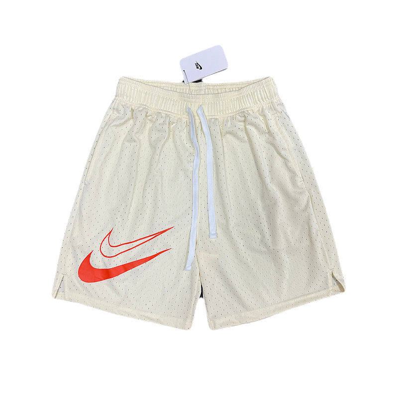 BERMUDA NIKE DRI-FIT SALMÃO